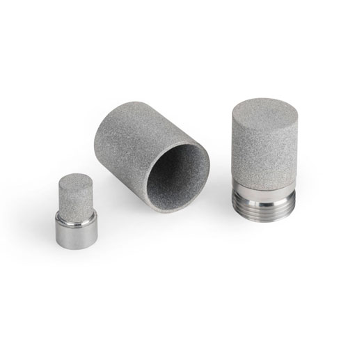 Three metal wine stoppers with varying sizes and textures displayed on a white background.